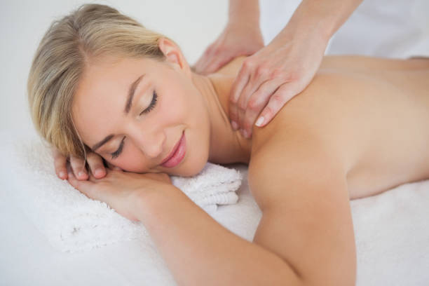 istock Pretty blonde enjoying a massage 844299994