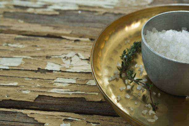 istock Bowl of salt in a plate 844300398