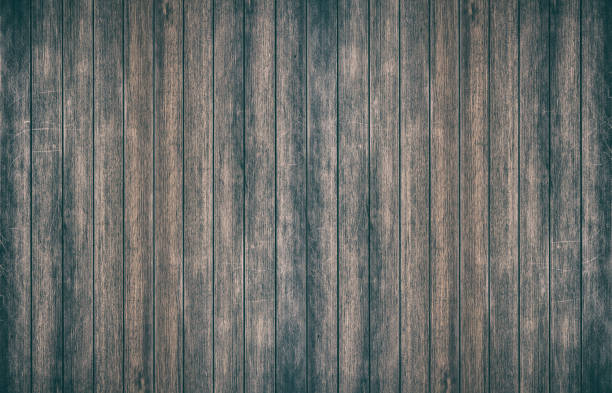 istock Vintage surface wood table and rustic grain texture background. Close up of dark rustic wall made of old wood table planks texture. Rustic brown wood table texture background template for your design. 844300462
