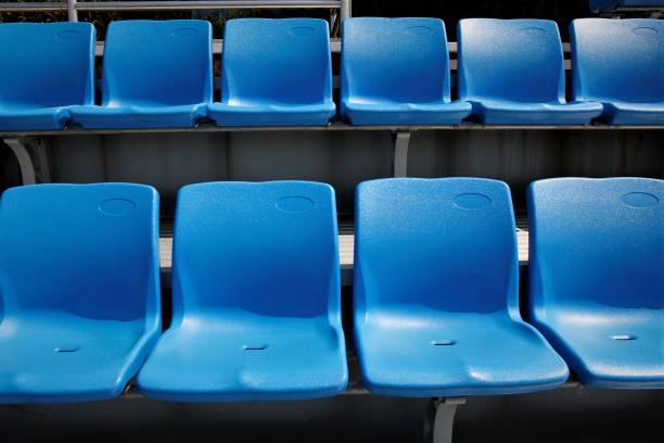istock Rows of stadium grandstand seats 844300876