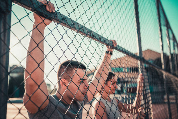 istock Friends having a rest after running 844309110