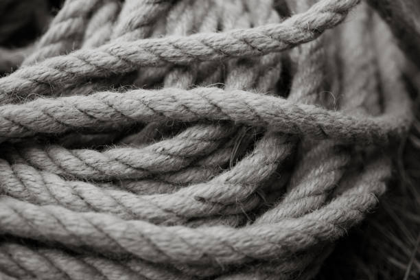 istock Old fashioned household rope. Black and white photo 844312562