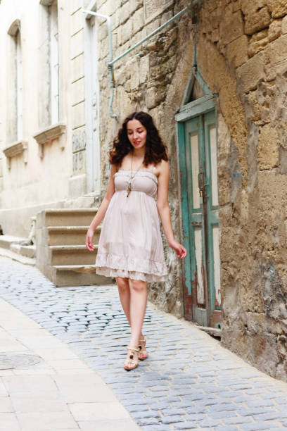istock Young girl strolling through narrow streets 844312644