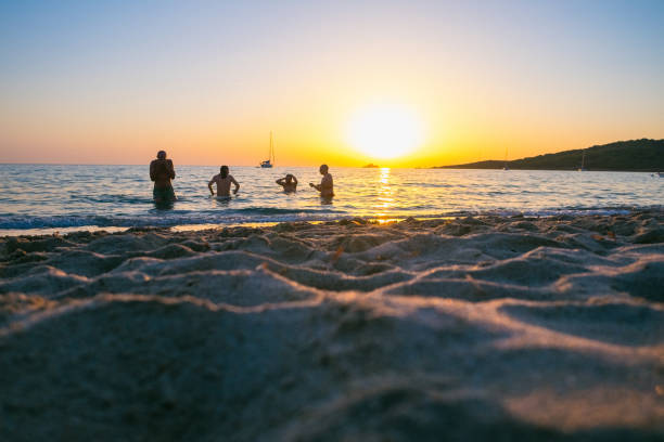 Friends enjoying the sea and the beach