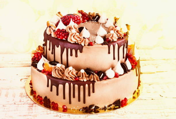 istock Festive two-tier cake with fruit streaks of chocolate 844323784
