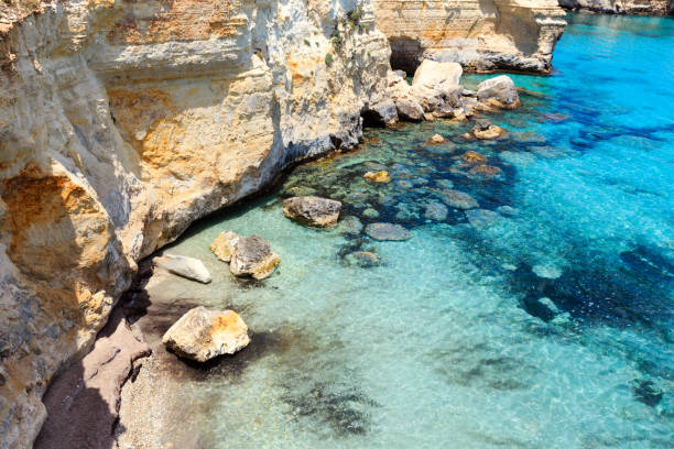 istock Faraglioni at Torre Sant Andrea, Italy 844326396