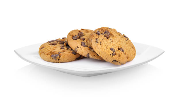 istock Chocolate chip cookie in ceramic white plate on white background 844326630
