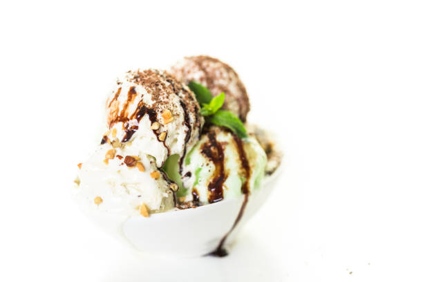 istock Vanilla and lime ice cream scoops with chocolate topping 844327110
