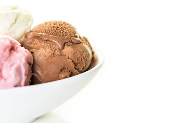 istock Variety of ice cream scoops in a white bowl. 844327144