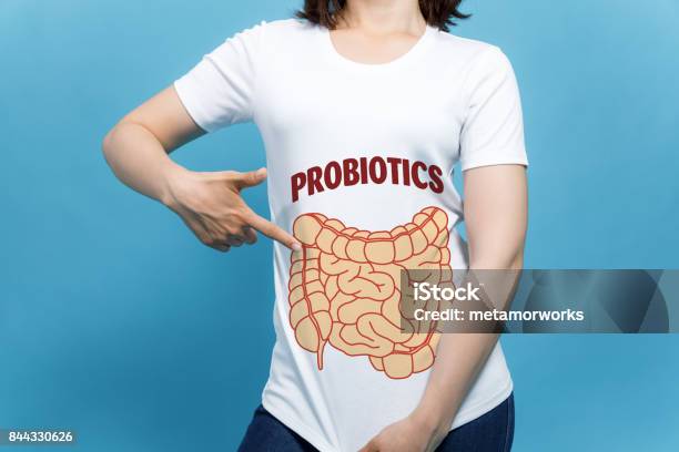 Young Woman Wearing A Tshirt Printed With An Intestinal Illustration Stock Photo - Download Image Now