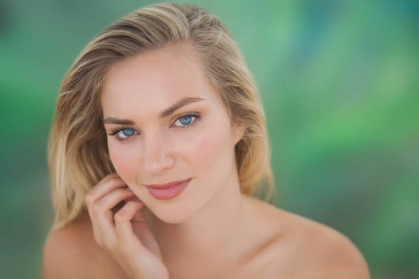 istock Beautiful natural blonde looking at camera 844332754