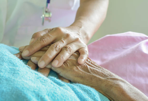 istock hospital patient hands to care 844333060