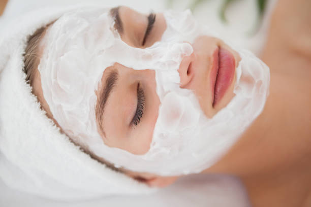istock Beautiful blonde getting a facial treatment 844333094