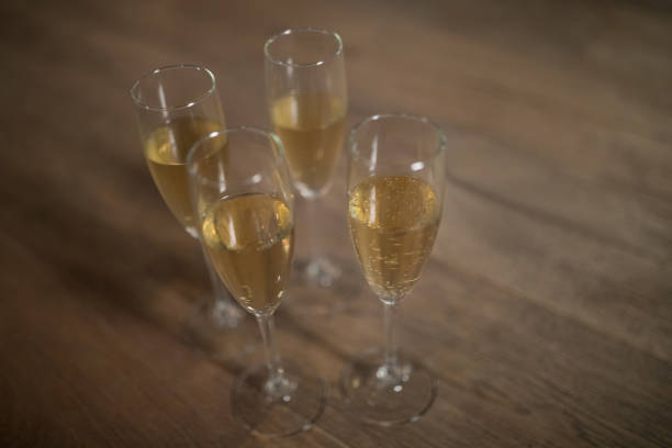 istock Glasses of champagne arranged on table 844334574