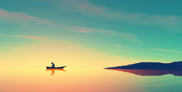istock Man in a boat on the lake at sunset 844334906