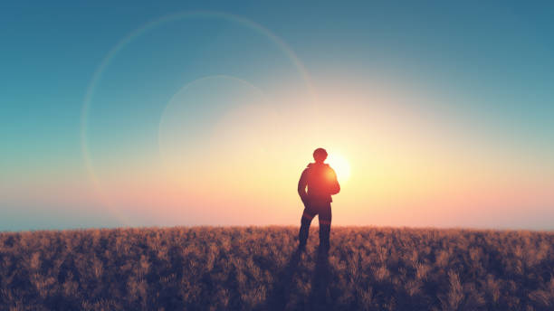 istock Man look on the sun in a field 844334914