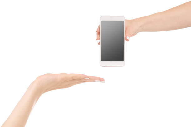 istock Female hand give over a mobile phone smartphone 844335236
