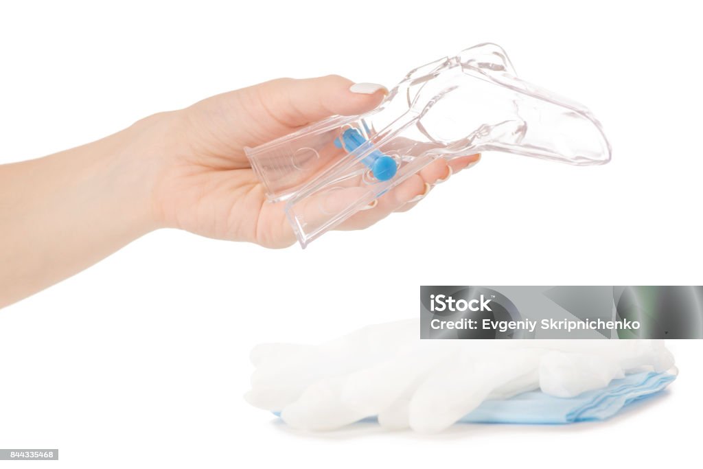 Female hands gynecological mirror examination gynecologist isolation Female hands gynecological set gynecologist on white background isolation People's Action Party - Singapore Stock Photo
