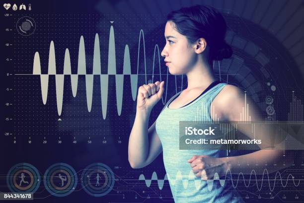 Sports Technology Concept Running Woman And Various Technological Abstract Graphics Sport Science Stock Photo - Download Image Now