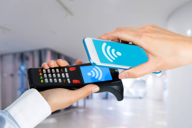 istock handy terminal and smart phone. Cashless settlement. interrogator. radio tag reader/writer. smart logistics concept. 844341864