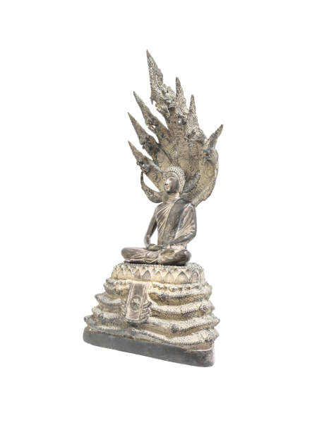 istock Closeup old silver buddha statue with a naga over his head isolated on white background with clipping path 844341922