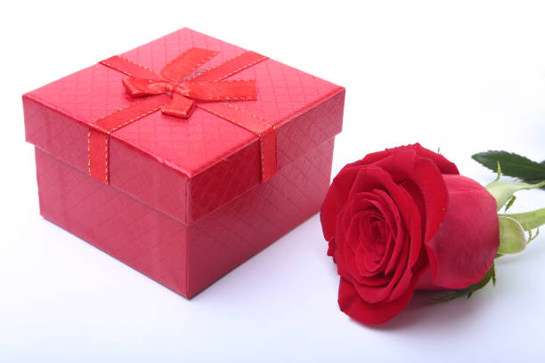 istock Gift boxes with bow and rose on white background. Decoration. 844342218