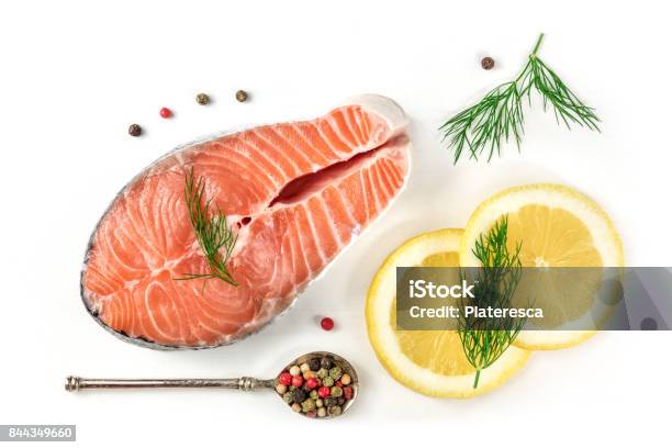Salmon Steak With Lemons Dill And Peppercorns On White Stock Photo - Download Image Now