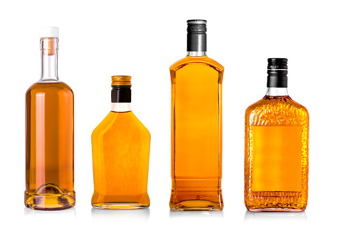 Set of Beautiful Whisky Bottles against well lit background
