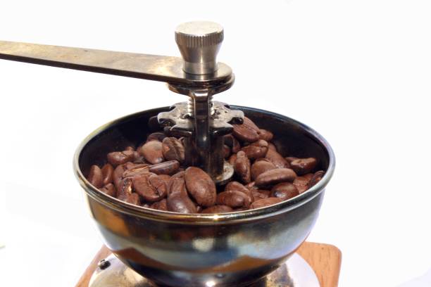 istock Coffee beans in manual coffee grinder 844350570