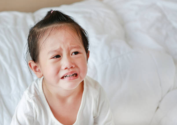 istock Close up Little kid girl crying. 844350690