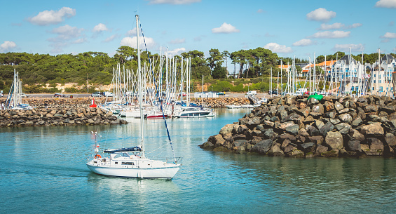 Newport is a seaside city on Aquidneck Island in Rhode Island. It is known as a New England summer resort