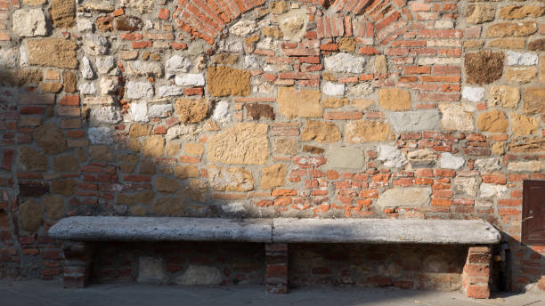 istock a stone bench in a medieval village 844360892