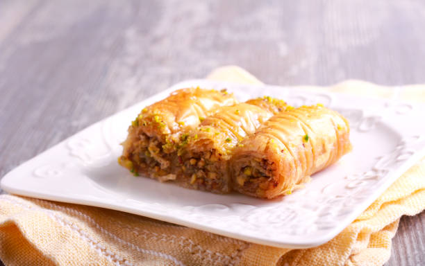 istock Baklava with pistachios and honey on plate 844371608