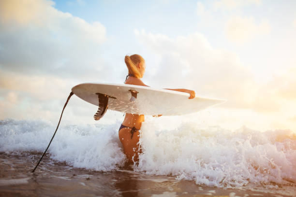 istock young surfer woman 844371874