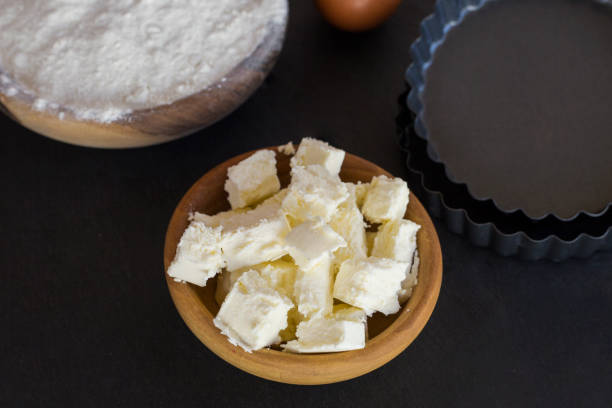 istock flour and ingredients on black table. Top view 844372088