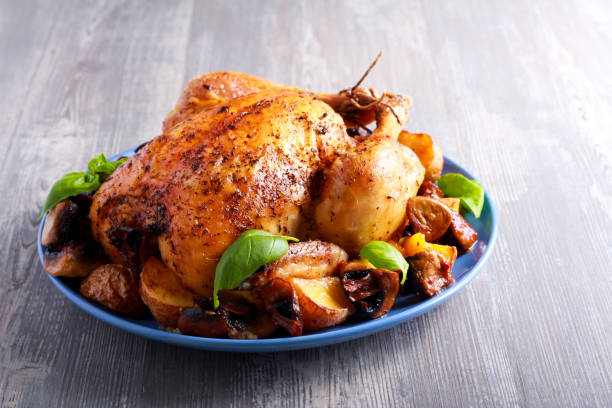 Roast chicken with potato and mushrooms Roast chicken with potato and mushrooms on plate prepared potato photos stock pictures, royalty-free photos & images