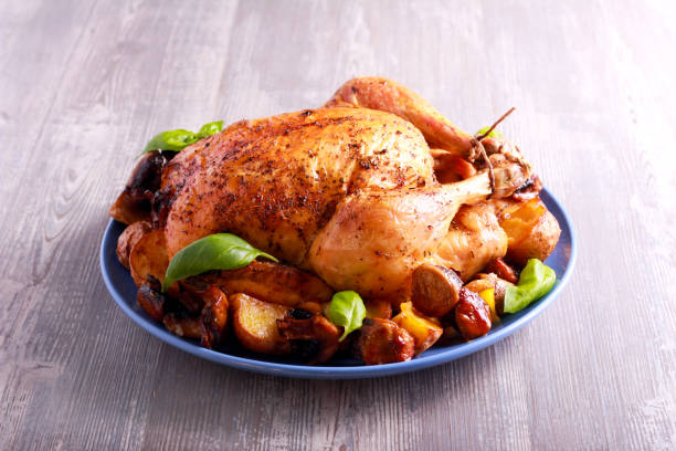 istock Roast chicken with potato and mushrooms 844377442