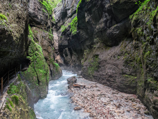 The river in Partnach Gorge of  mountains in Bavaria, Germany The river in Partnach Gorge of  mountains in Bavaria, Germany . partnach gorge stock pictures, royalty-free photos & images