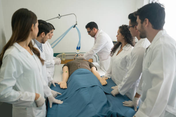 istock Group of medical students in a CPR class 844393090
