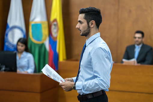 Portrait of a lawyer in trial at a Colombian court - legal system concepts