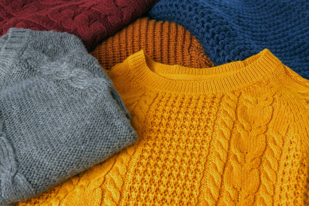 istock Concept knitted wool colorful warm sweaters closeup 844393792
