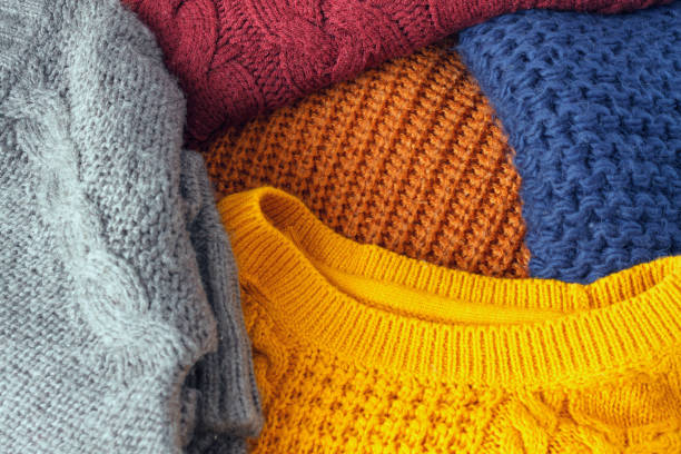 istock Concept knitted wool colorful warm sweaters closeup 844393854