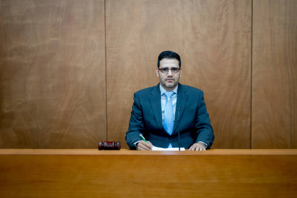 istock Judge working at the courtroom 844394380