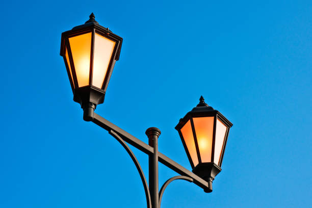 istock Street lamps blue background 844398016