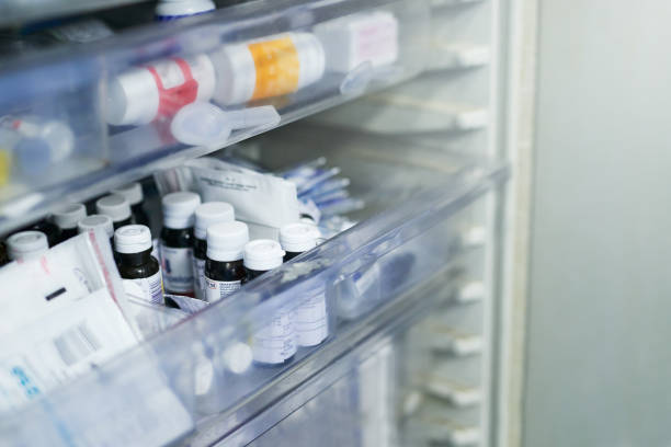 Stocked with life saving drugs Shot of shelves stocked with medication in a hospital medical supplies stock pictures, royalty-free photos & images