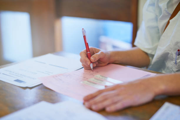 istock Keeping her patient’s details up to date 844400562