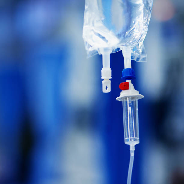 Saving a life one drop at a time Closeup shot of medicine in an iv drip at a hospital iv drip photos stock pictures, royalty-free photos & images