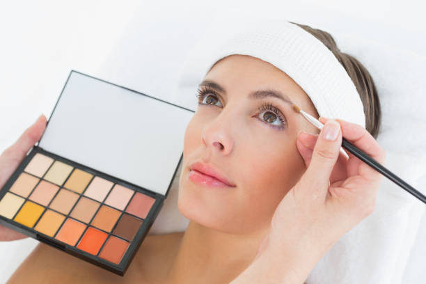 istock Hand applying eyeshadow to beautiful woman 844400824