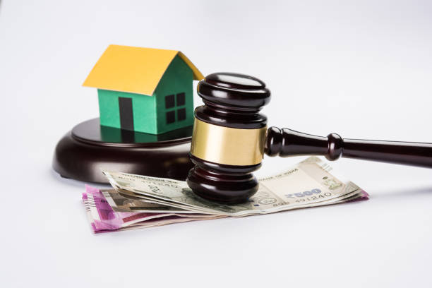 stock photo of india and real estate law, Indian law for real estate / construction company / architects / builders or buyers showing small house model, gavel / hammer, indian currency notes stock photo of india and real estate law, Indian law for real estate / construction company / architects / builders or buyers showing small house model, gavel / hammer, indian currency notes houses stock pictures, royalty-free photos & images