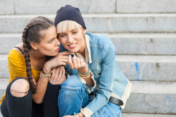 istock Two girls sitting on stairs 844401474